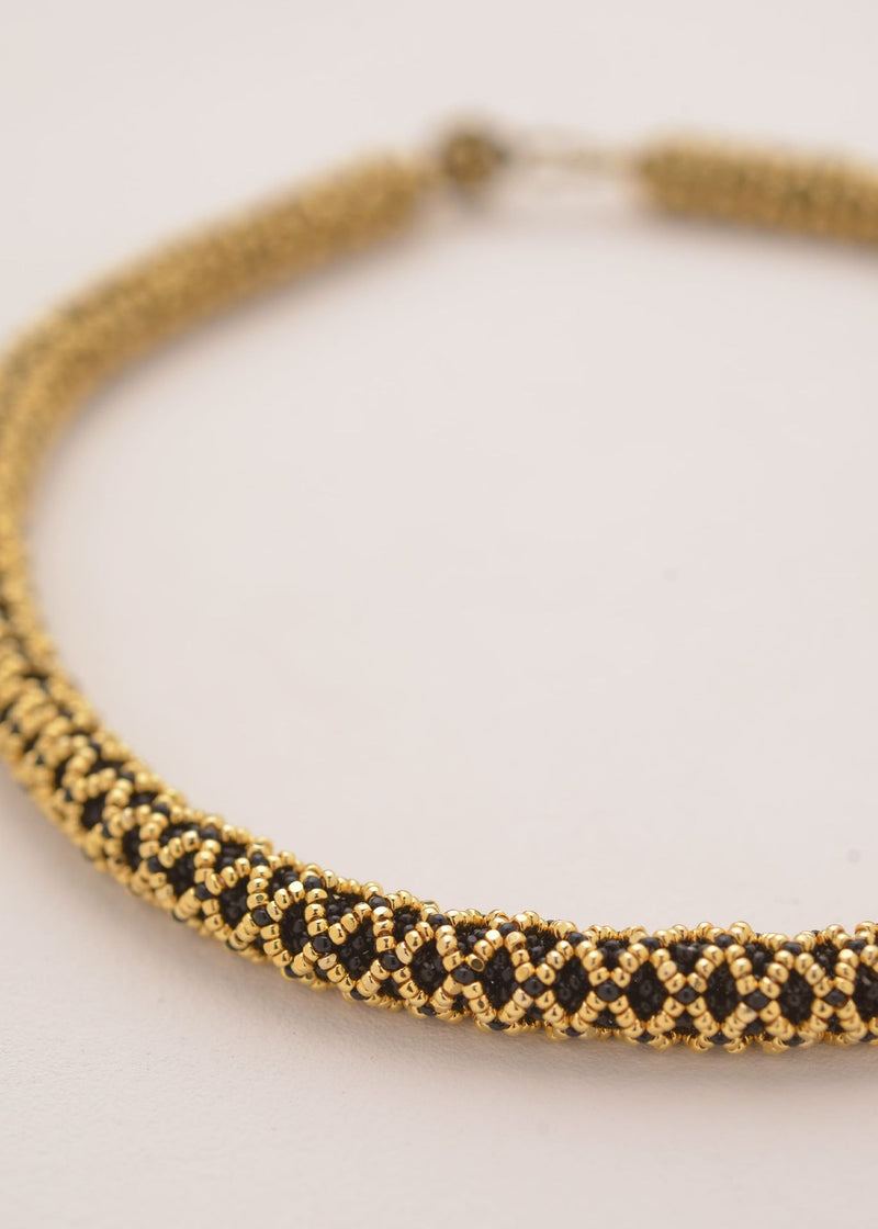 GARGANTILLA NAWI ORO NEGRO