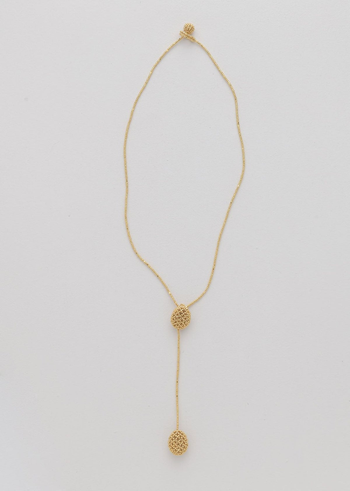 COLLAR DOS TAWARI ORO