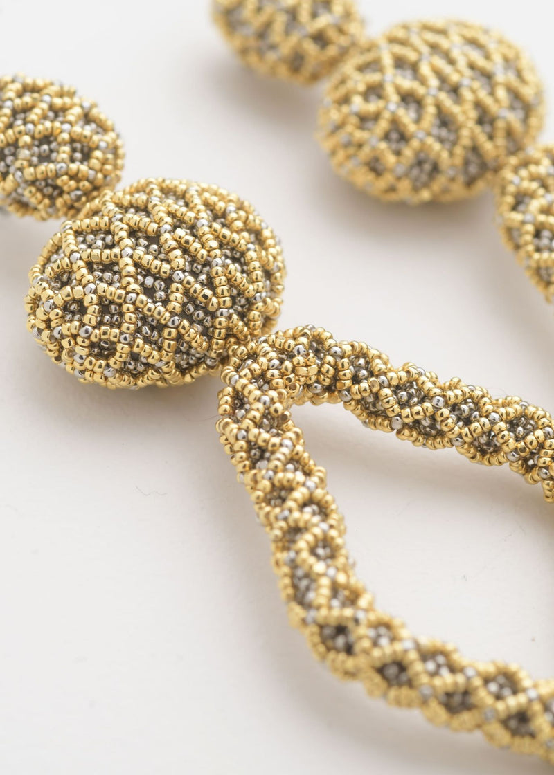 ARETES HAUTE TEJIDO ABIERTO TAWARI ORO PLATINO