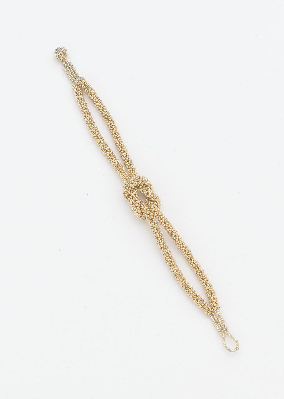 BRAZALETE NUDO TAWARI ORO PLATINO