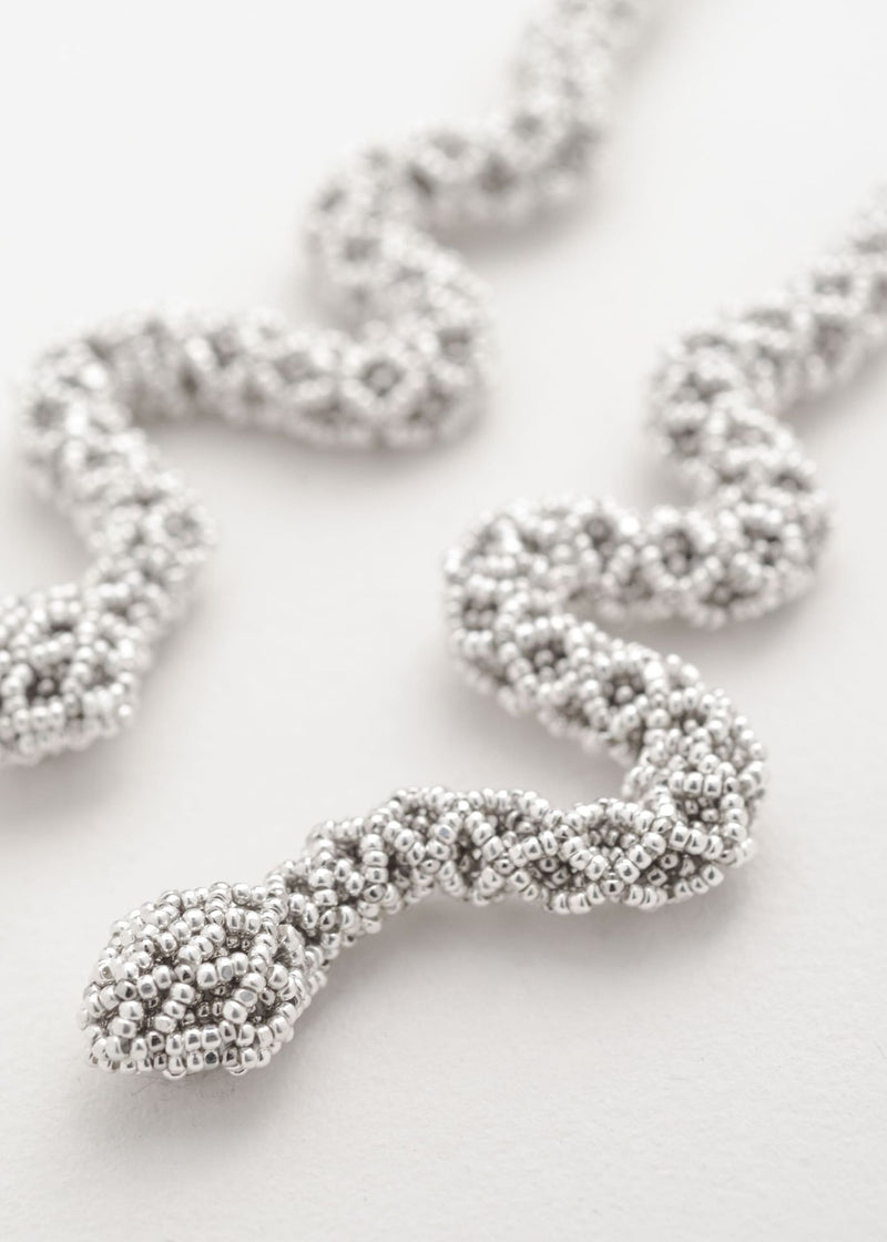 ARETES SERPIENTE NAWI PLATA PLATINO