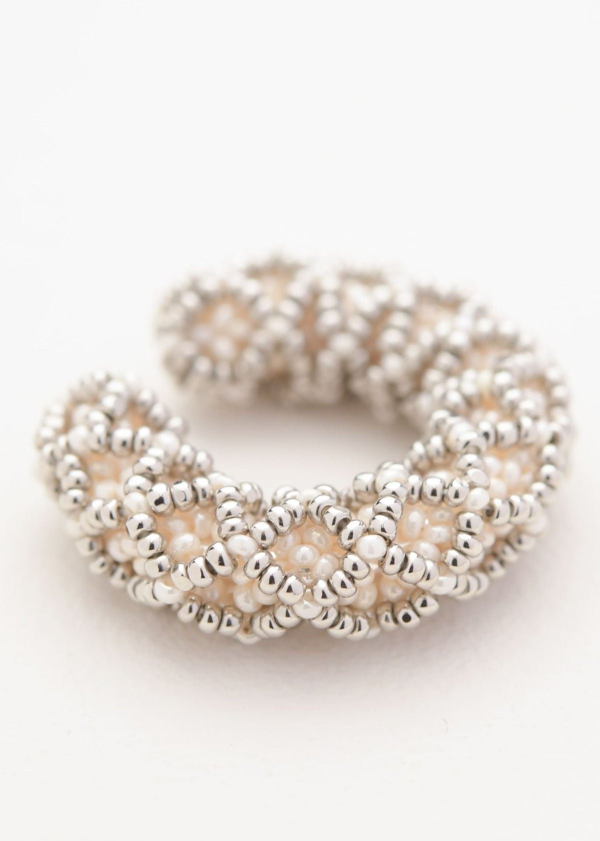 NAWI EAR CUFF, PEARLISED CREAM PLATINUM
