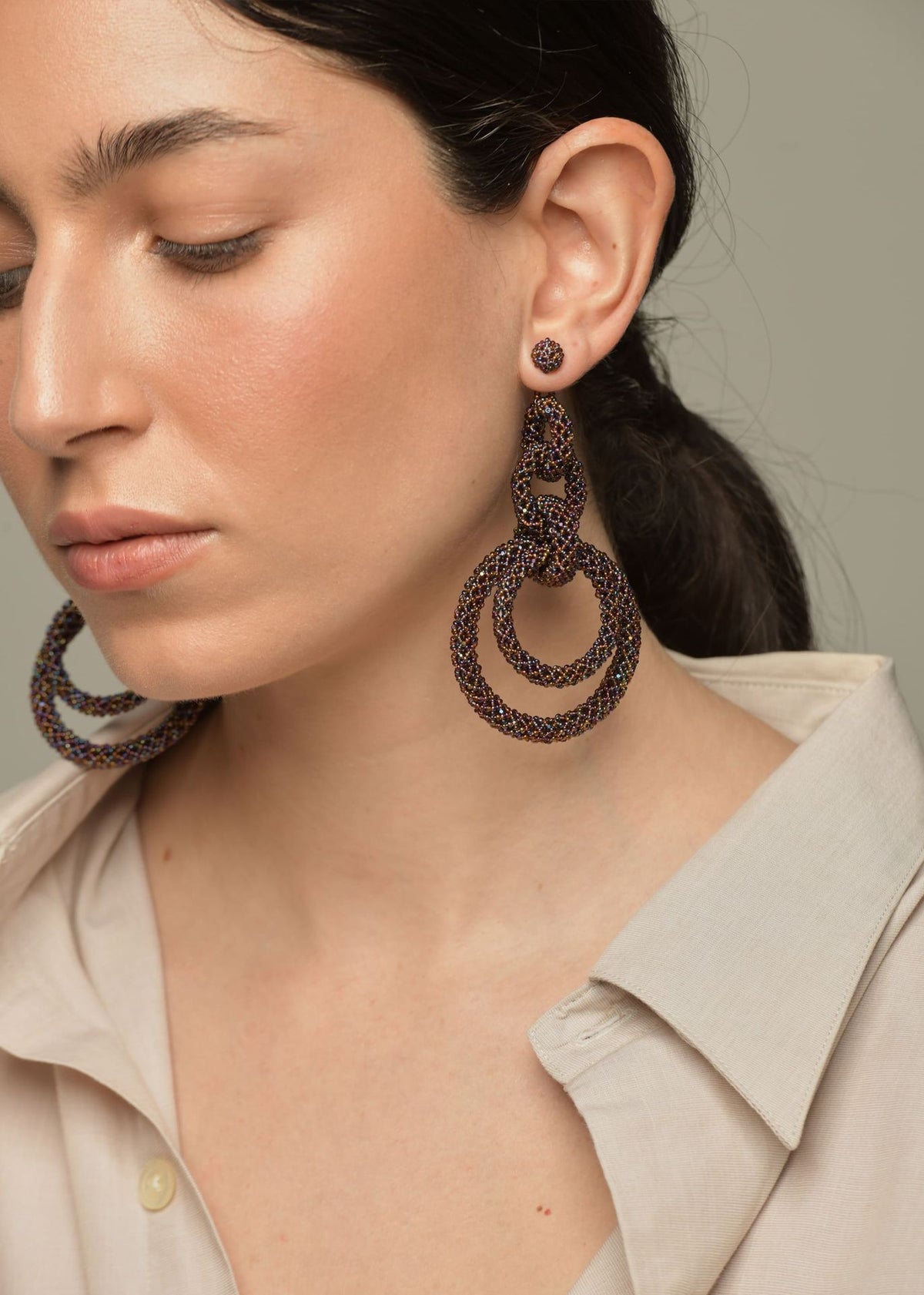 ARETES CINCO AROS CADENA PLATINO TG GARNET LUSTRE