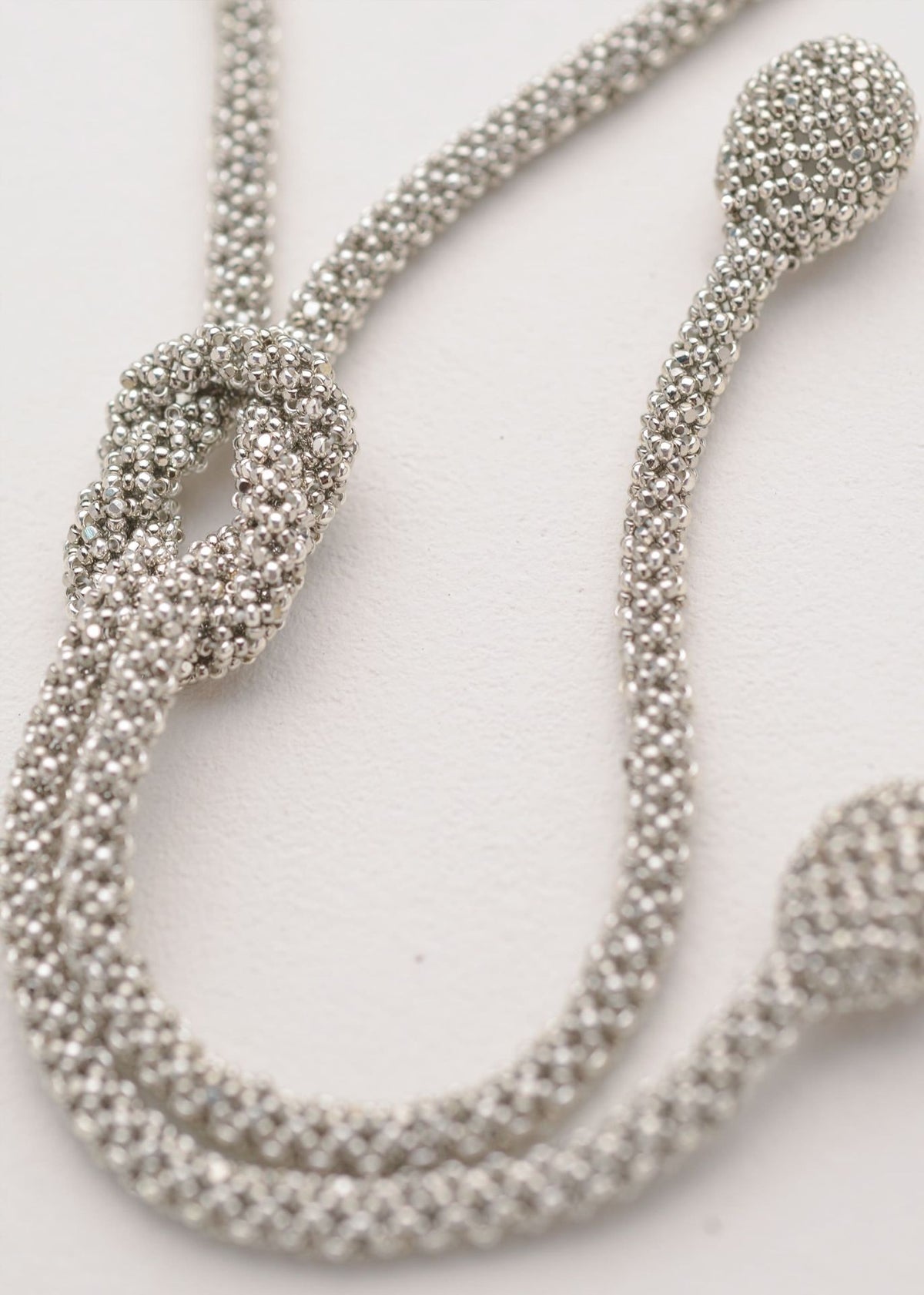 TAWARI KNOT NECKLACE PLATINUM SILVER