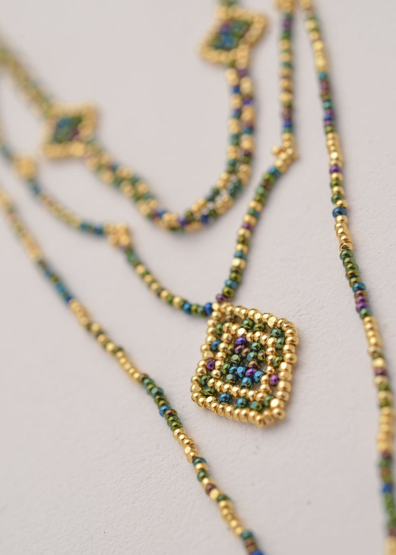 COLLAR WIXA LINEAL ORO VERDE TORNASOL