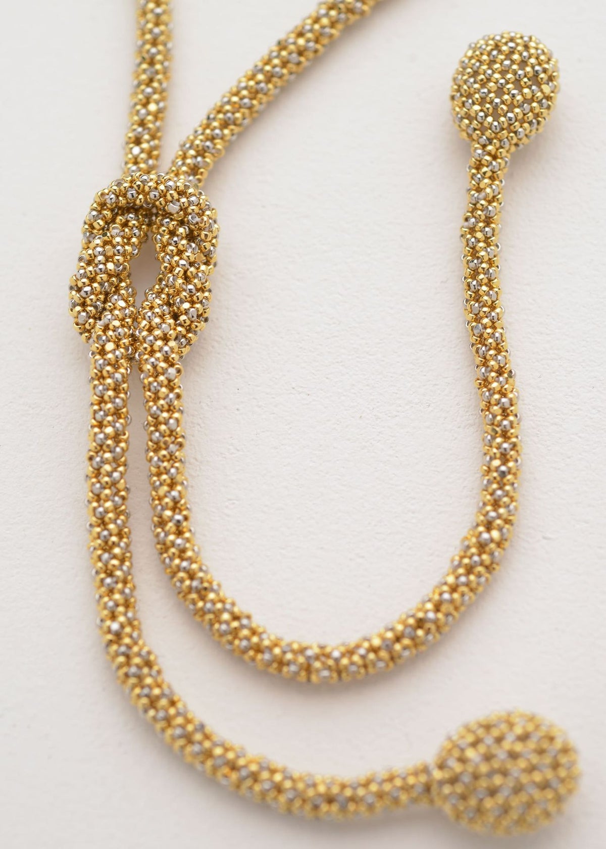 TAWARI KNOT NECKLACE GOLD PLATINUM
