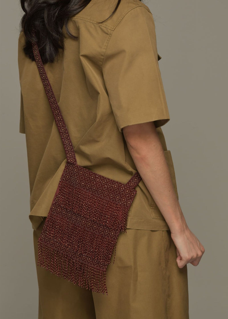 RED JAMAICA GOLD STRAP BACKPACK