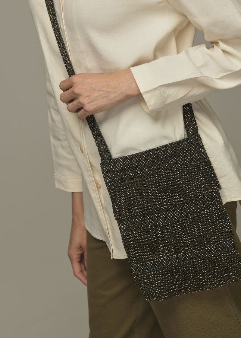 BLACK GOLD STRAP BACKPACK