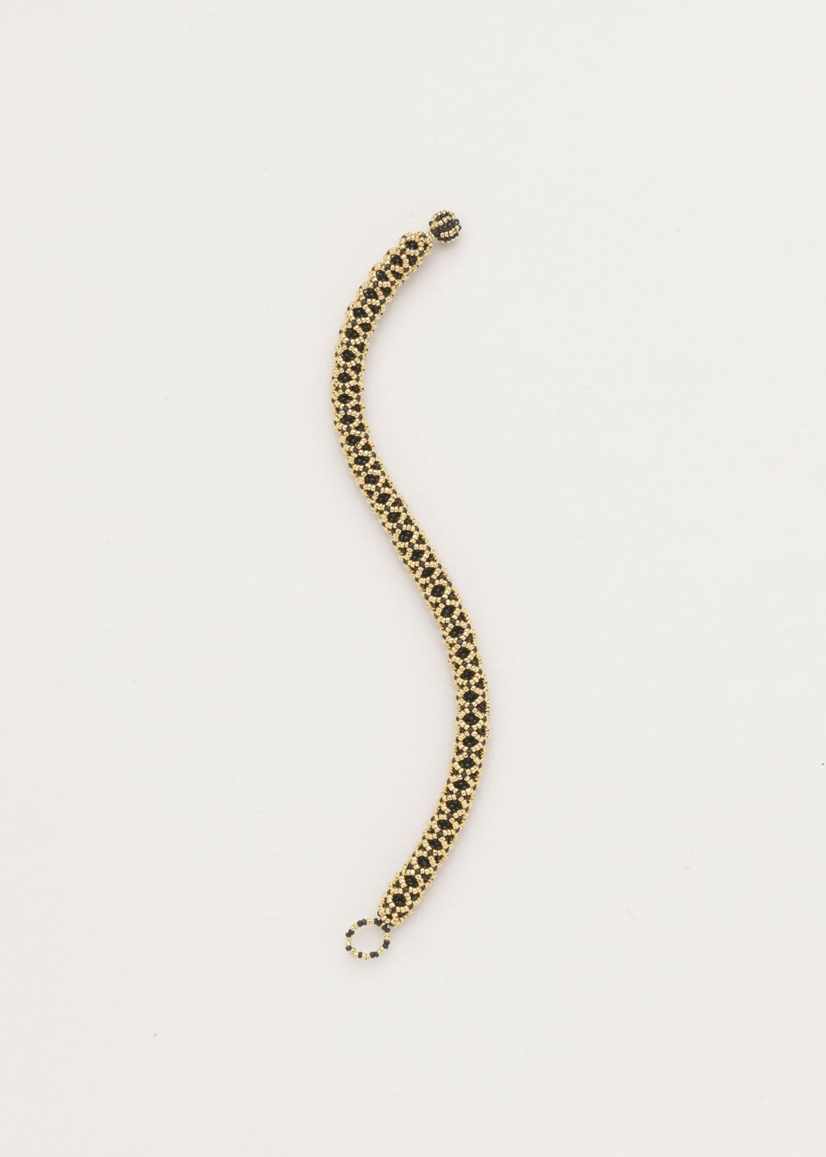 HUTA NAWI SNAKE BLACK GOLD BRACELET