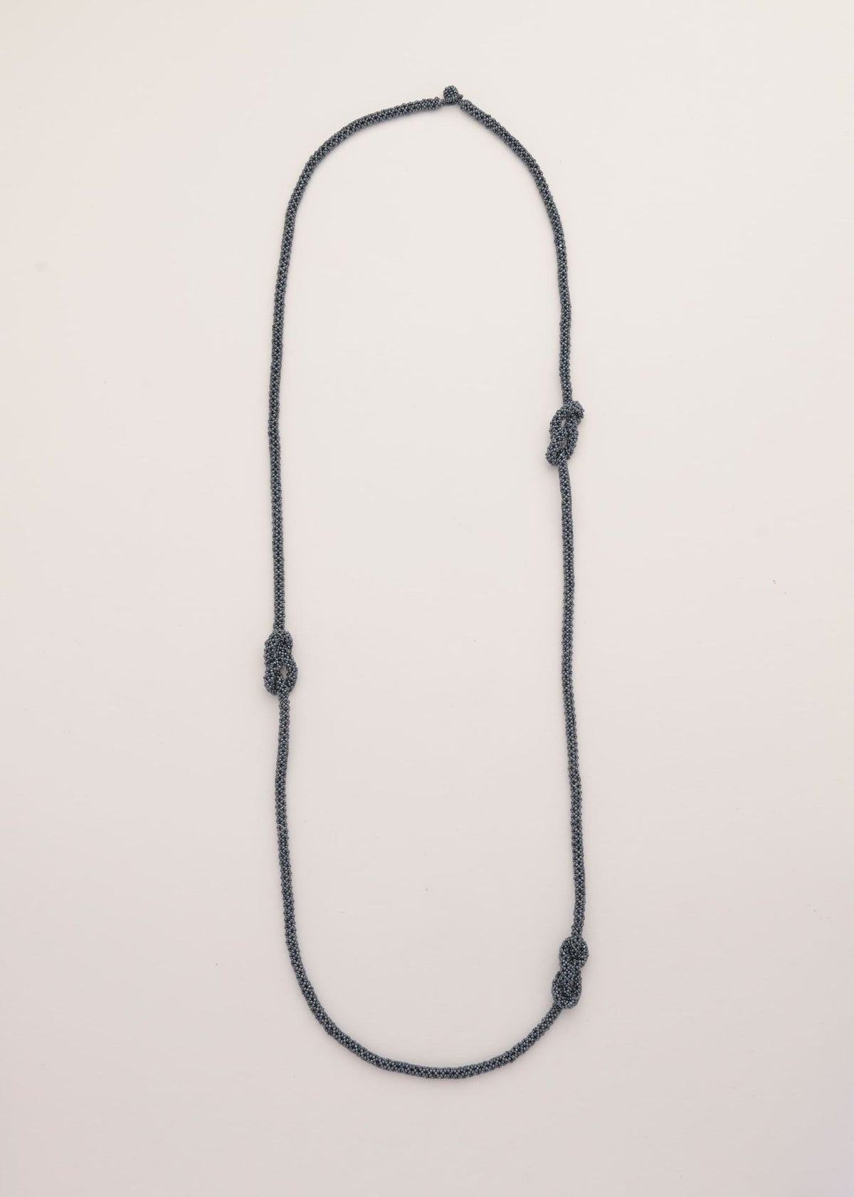 COLLAR TRES HAIKURI GRIS METALICO