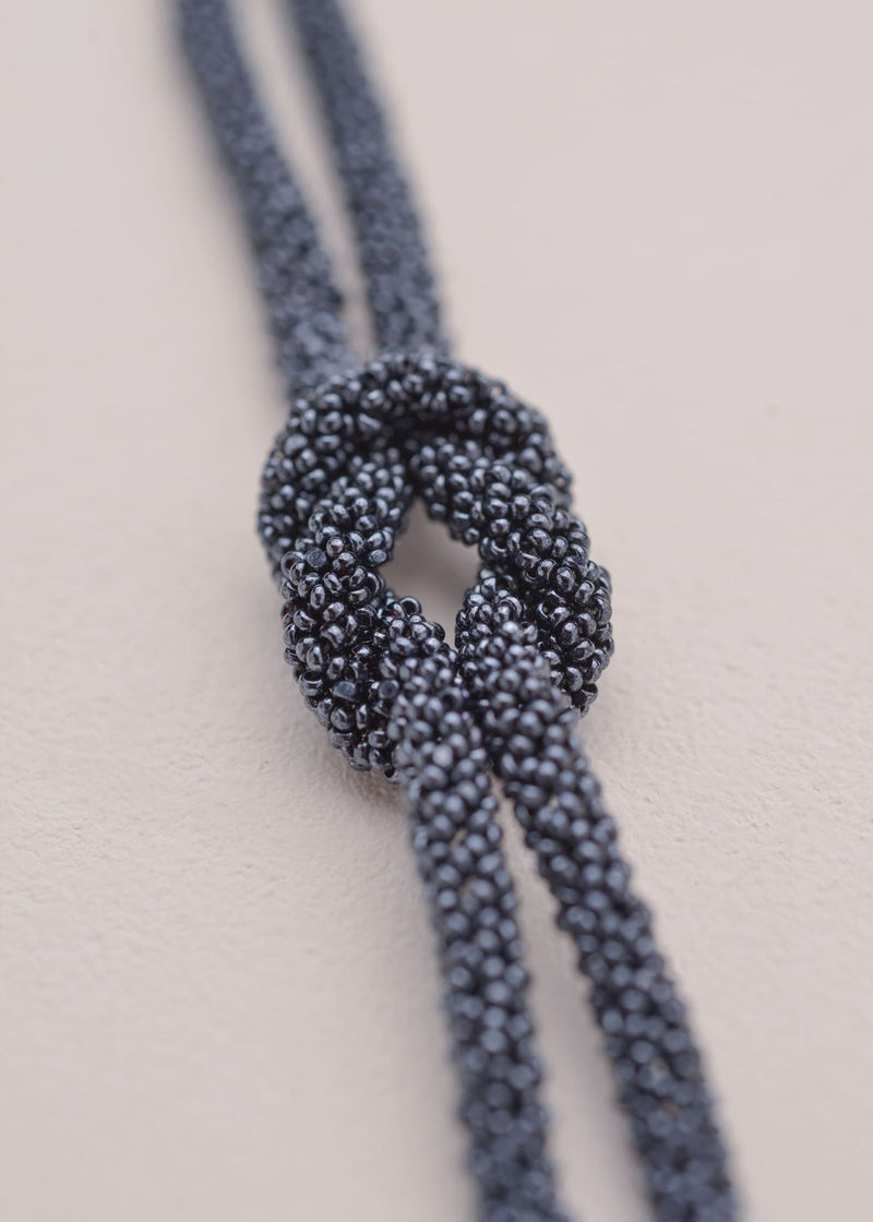 TAWARI KNOT METALLIC GREY BRACELET