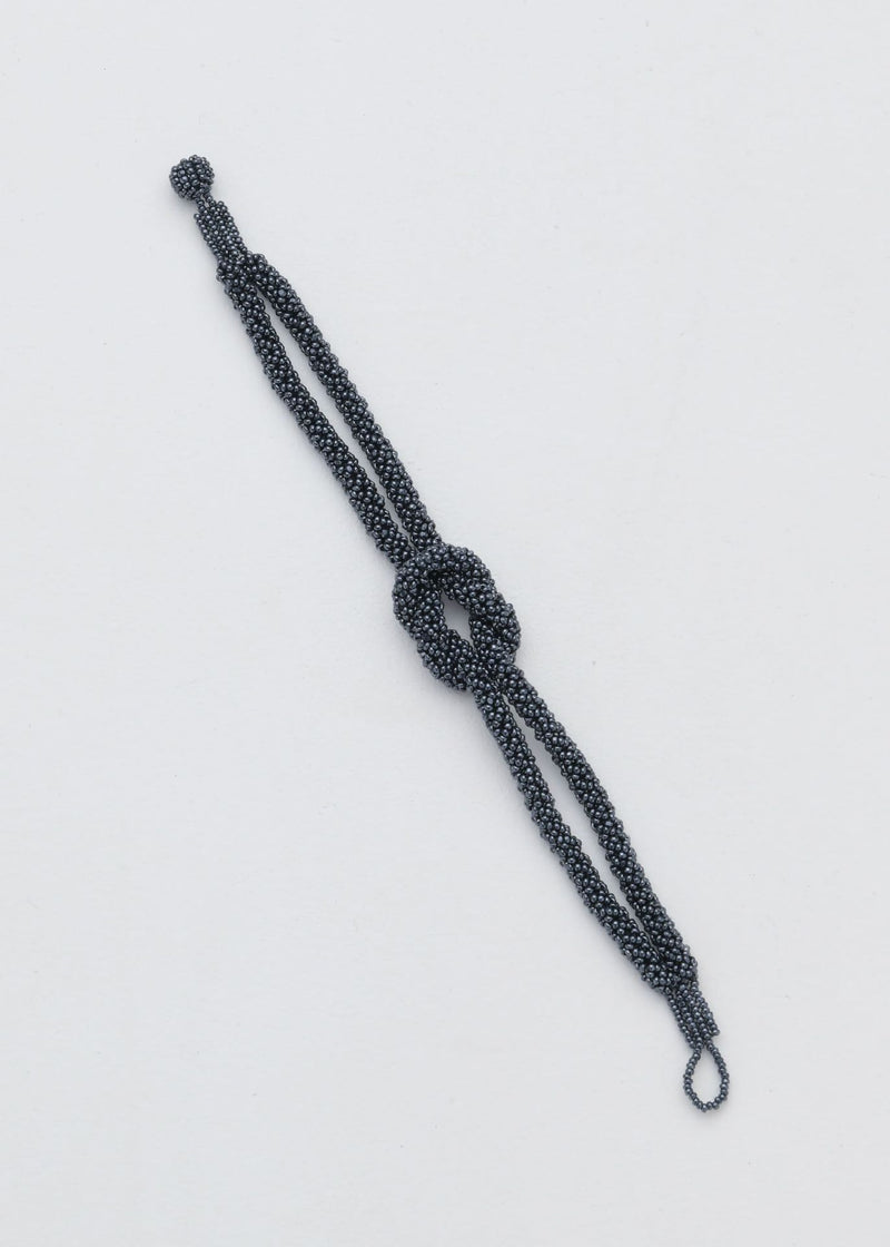 TAWARI KNOT METALLIC GREY BRACELET
