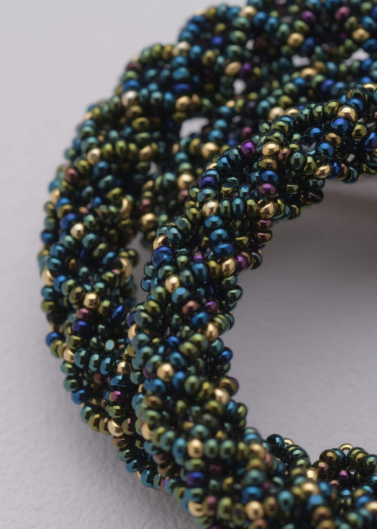 IRIDESCENT GREEN SPIRAL BROOCH
