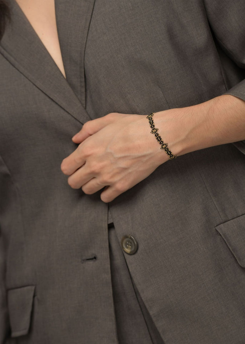BRAZALETE OJO DE DIOS CADENA ORO NEGRO