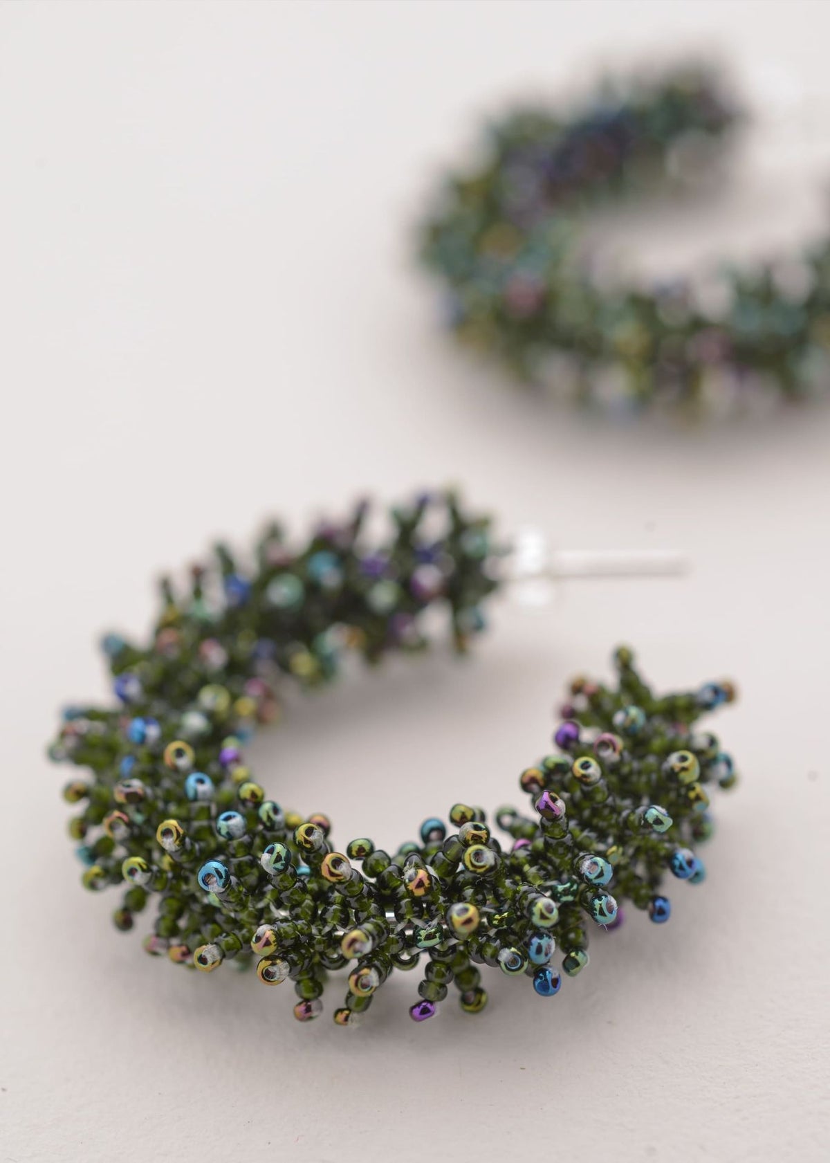 KIPURI SPIKED HOOP EARRINGS IRIDESCENT GREEN DARK BOTTLE GREEN