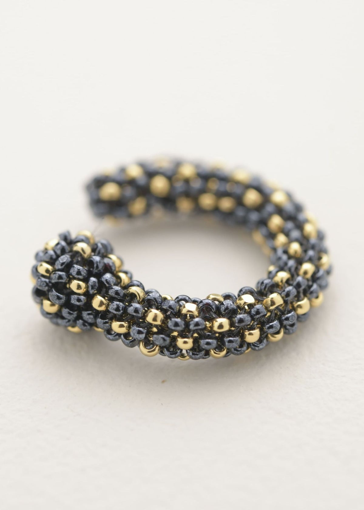 HUTA MARTHA METALLIC GREY GOLD EAR CUFF