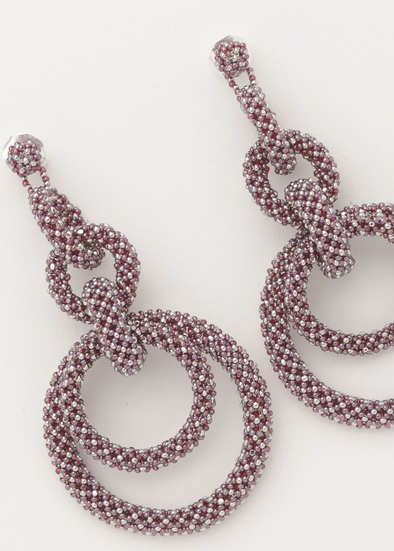 ARETES CINCO AROS CADENA PLATINO TG GARNET LUSTRE