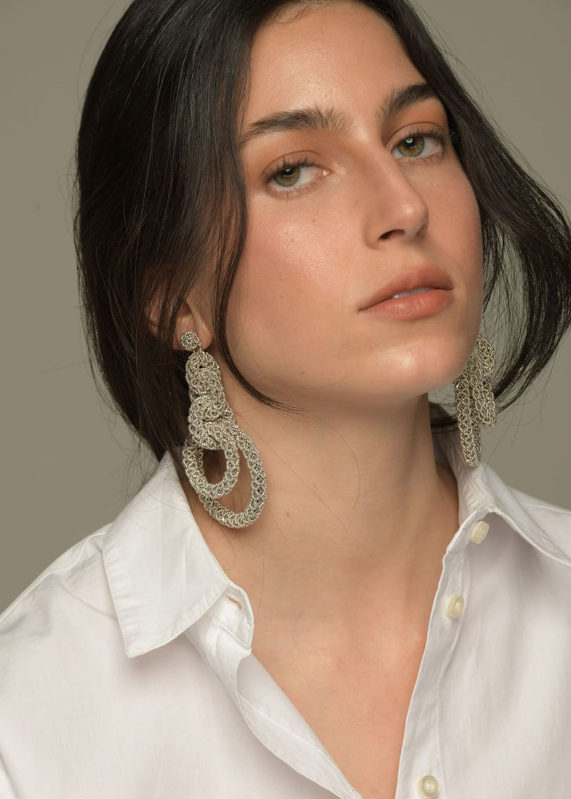 ARETES CINCO AROS NAWI PLATA PLATINO