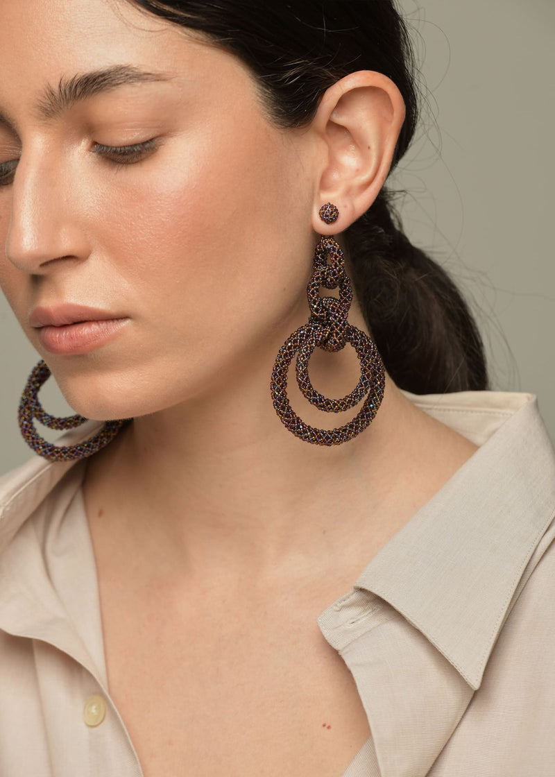 ARETES CINCO AROS CADENA PLATINO TG GARNET LUSTRE