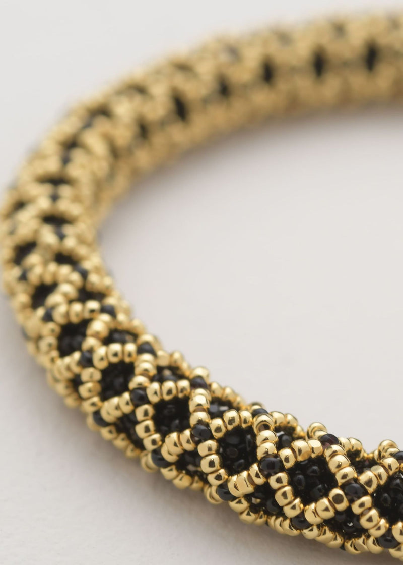 BRAZALETE HUTA SERPIENTE NAWI ORO NEGRO