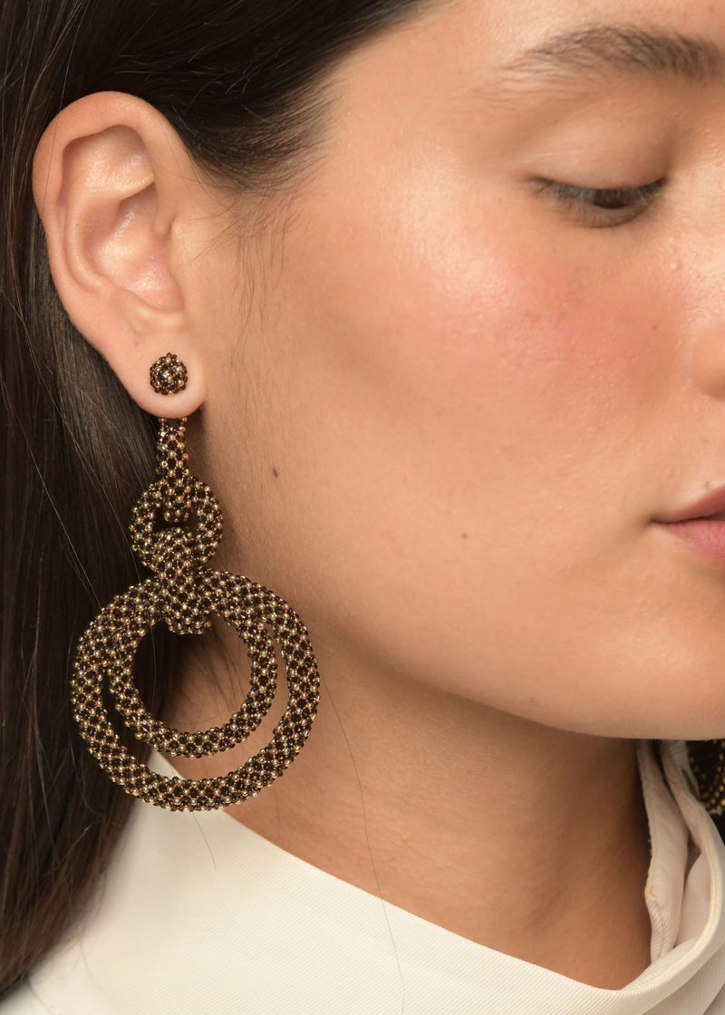 ARETES CINCO AROS CADENA ORO CAFÉ TRANSPARENTE