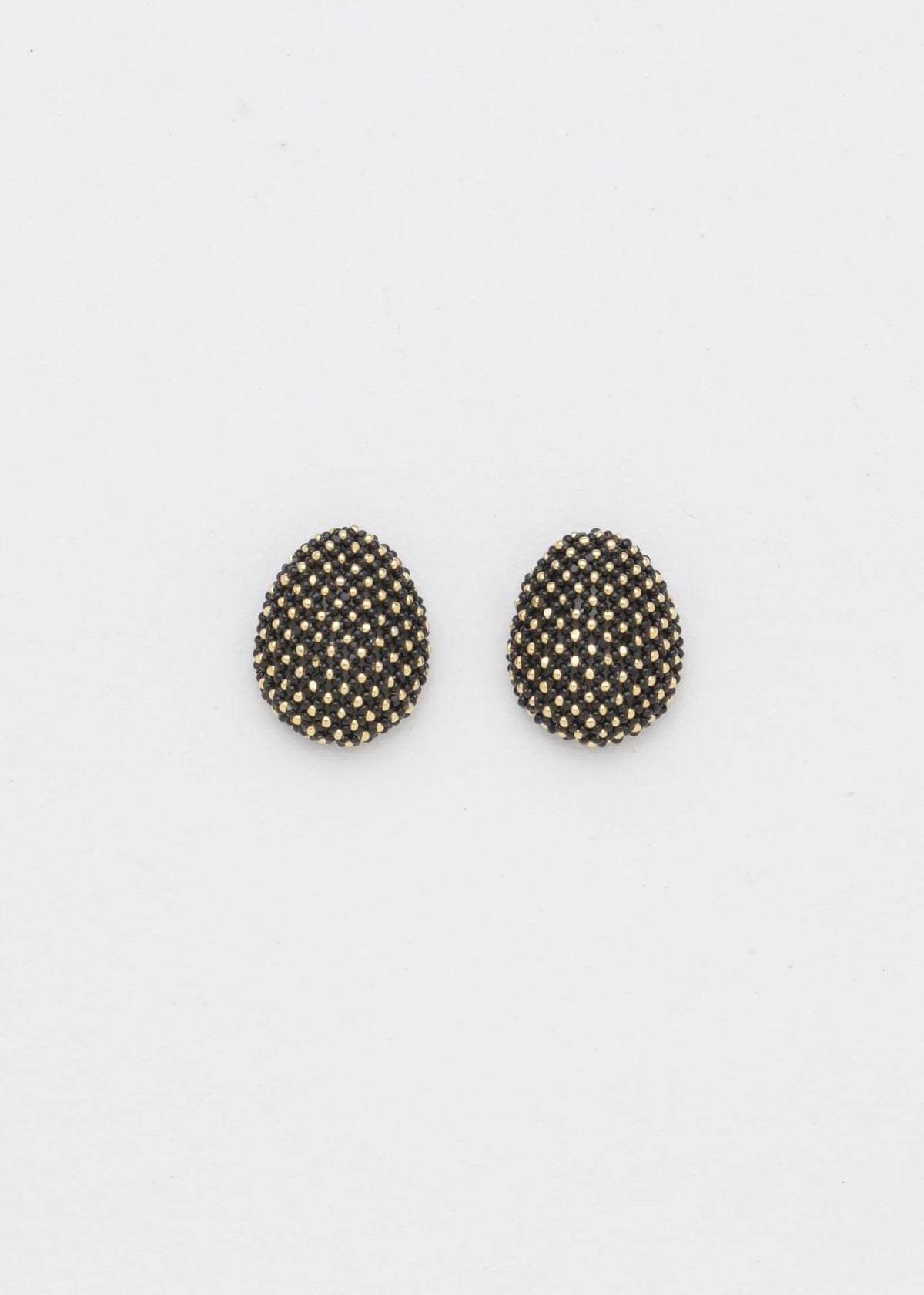 BROQUELES TAWARI ORO NEGRO