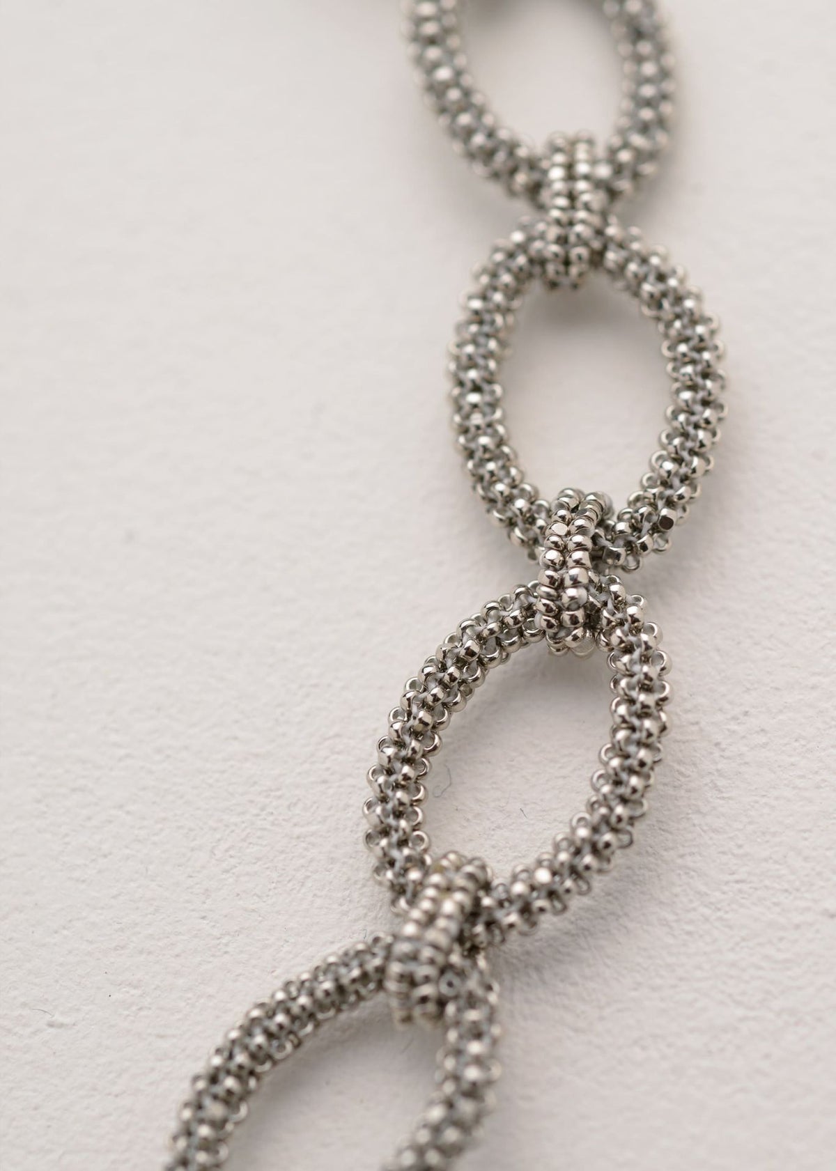 TAWARI PLATINUM HOOP NECKLACE
