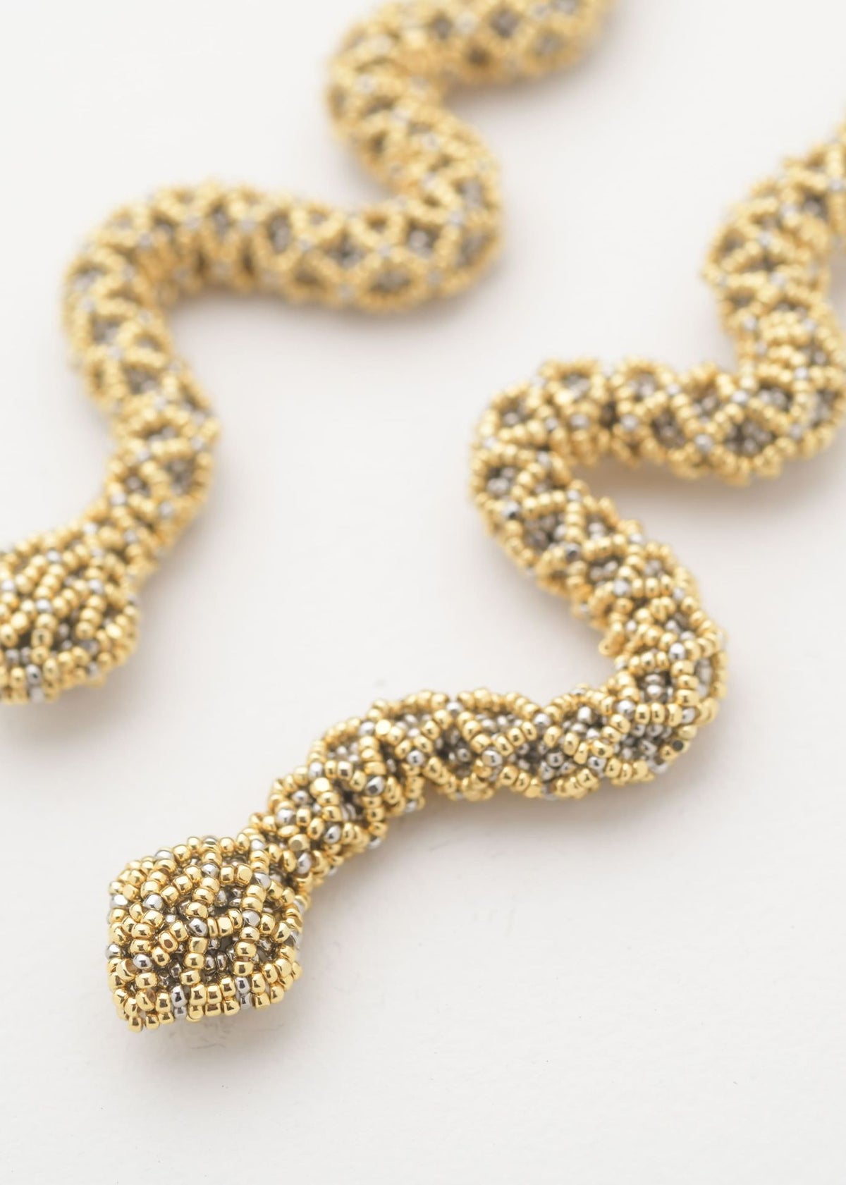 NAWI SNAKE EARRINGS GOLD PLATINUM