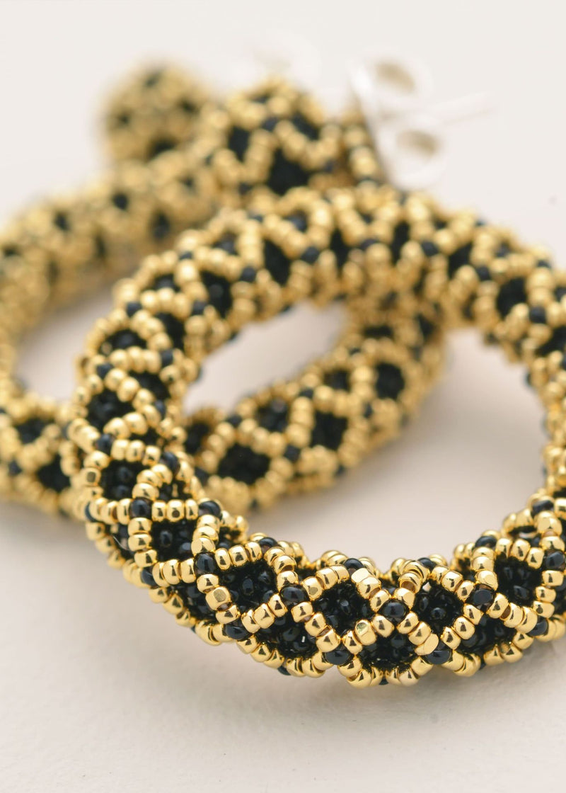 ARETES UN ARO NAWI ORO NEGRO