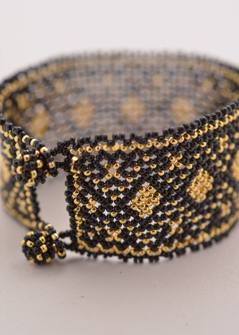 BRAZALETE MARTHA ORO NEGRO