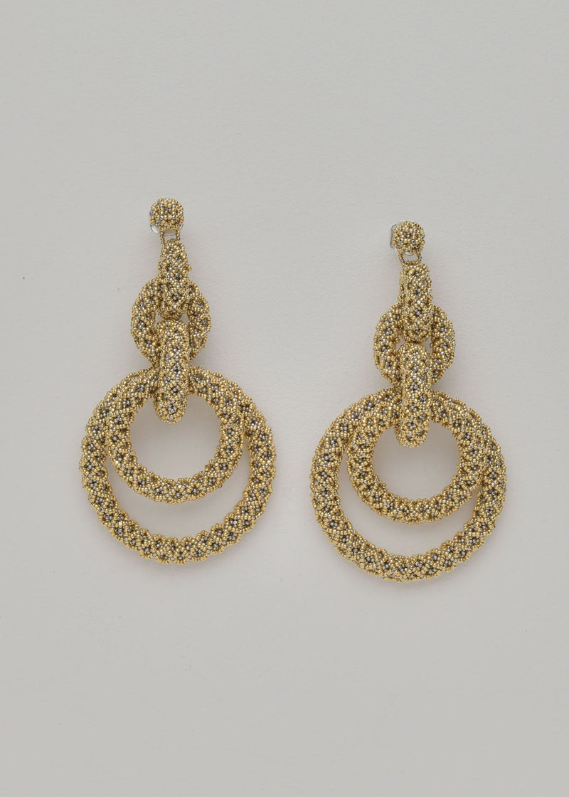 ARETES CINCO AROS NAWI ORO PLATINO